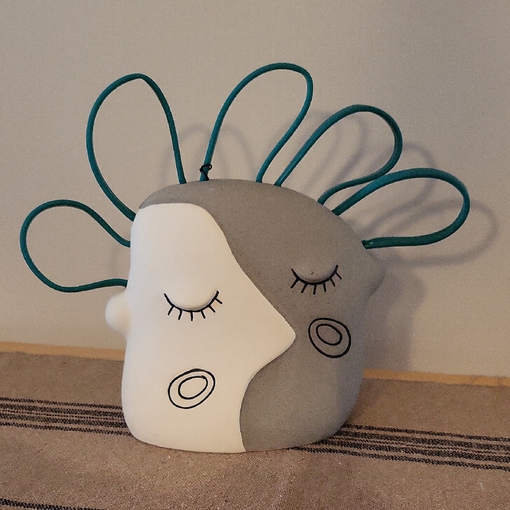 Abstract Face Aquarium Decor with Teal Accents